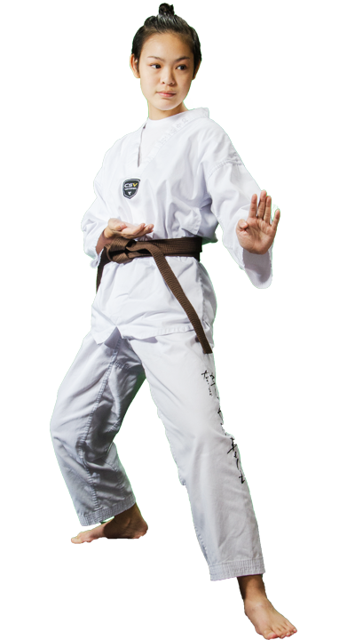 a teen girl is showing a taekwondo move